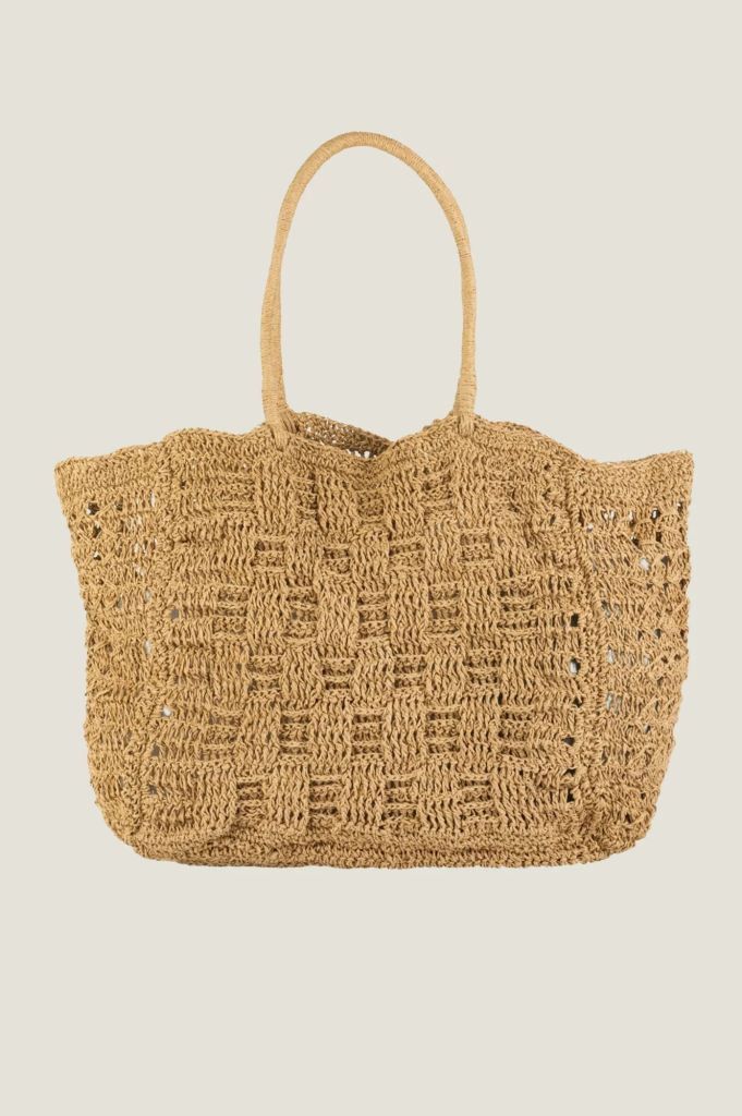 Woven straw tote bag with intricate patterns and sturdy handles, ideal for beach outings or casual shopping trips