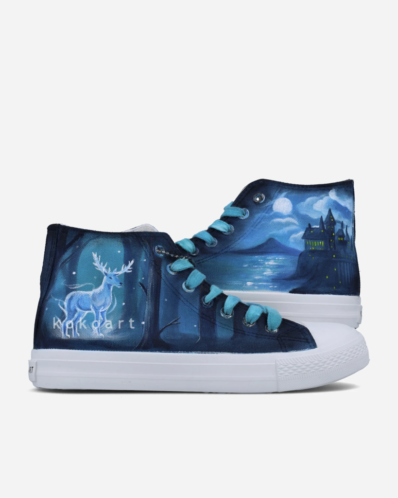 Hand-painted sneakers featuring mystical deer and castle under a moonlit sky, blue laces, white soles