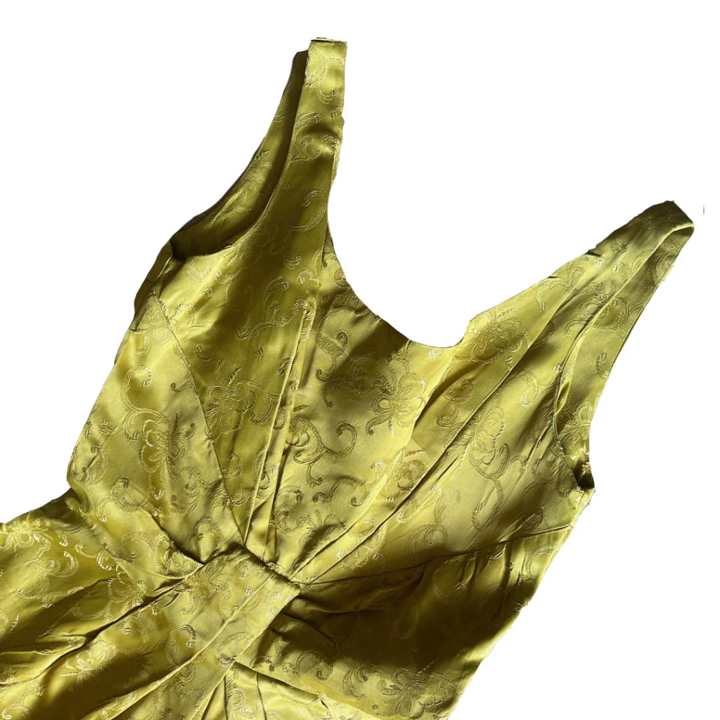 Elegant gold sleeveless dress with intricate floral embroidery on a white background.